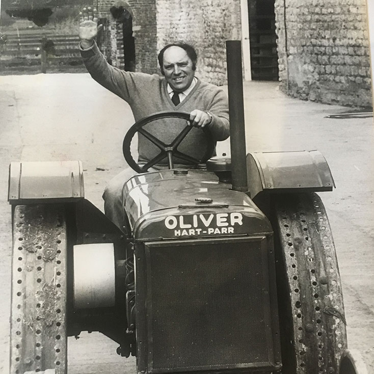 Jos Sturdy driving an old tractor at Eden Farm Jos Sturdy driving an old tractor at Eden Farm